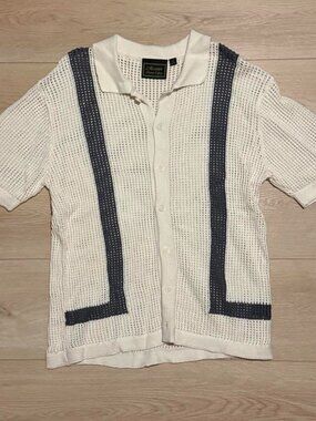 Cream white Massive Luxury Edition open-knit polo shirt.